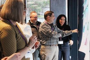 A group of people comment on a strategic plan.